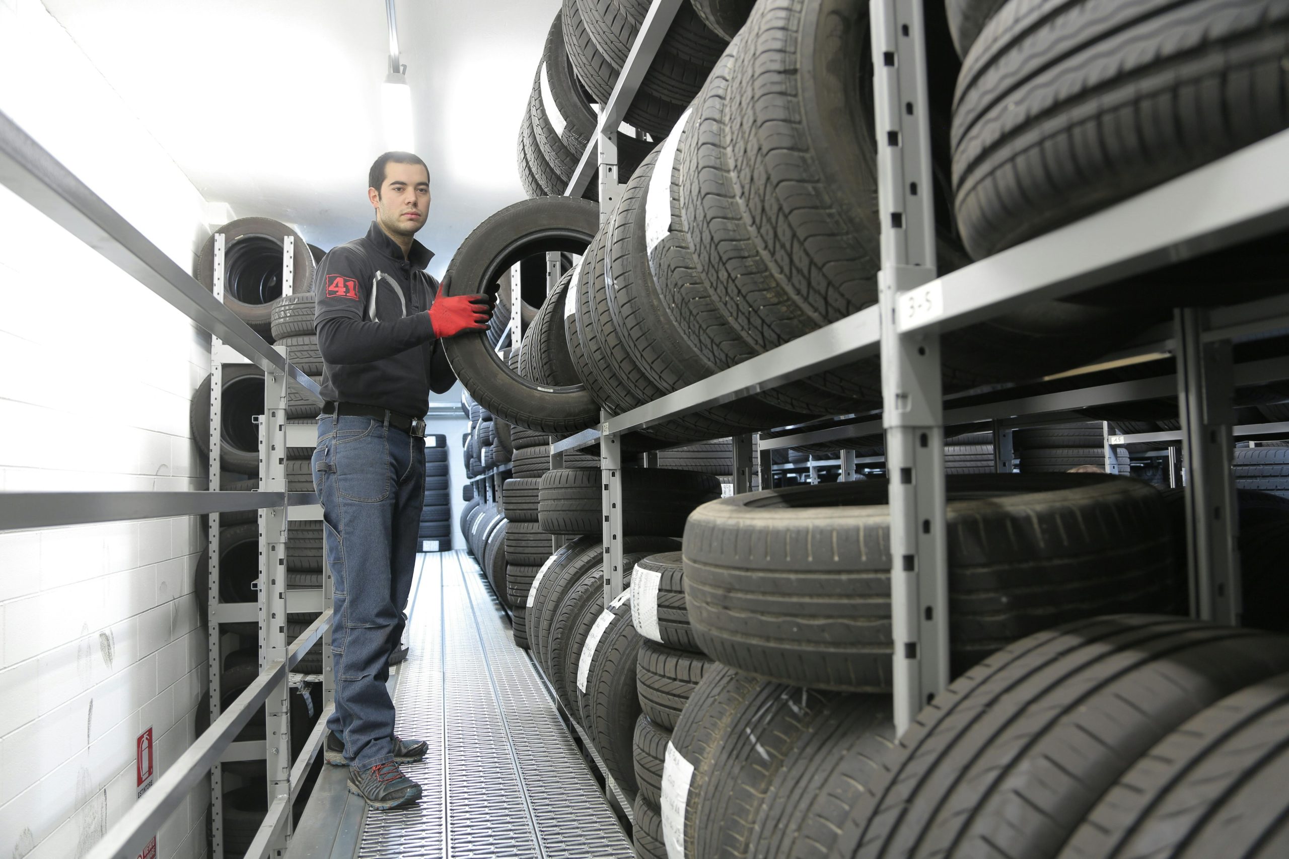 Mechanic picking out tires