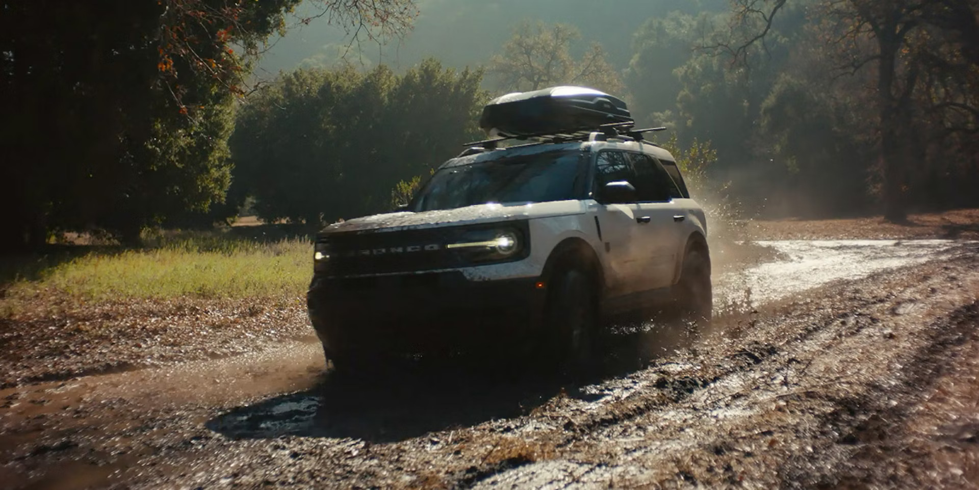 white ford bronco sport driving off road